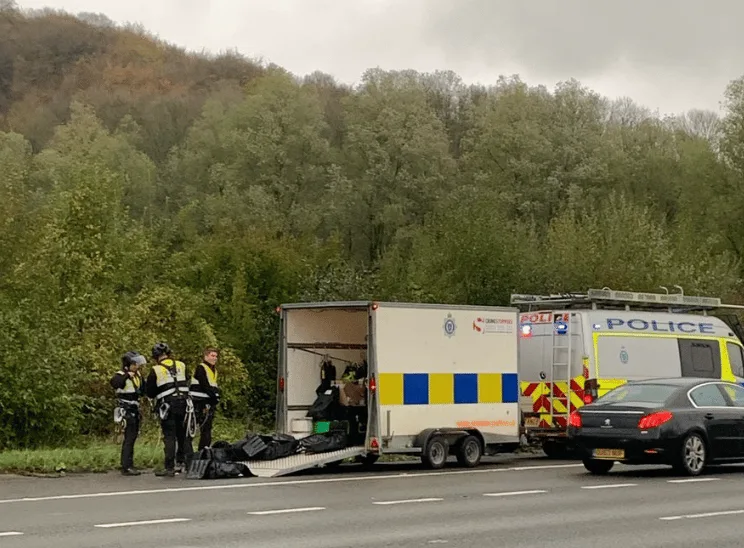 M25 closed in both directions after Just oil protestor laugh in the face of the law and climb on three grantries causing traffic chaos – …