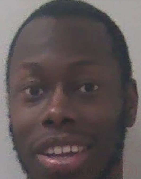 A drug dealer has been jailed after he attacked three prison officers