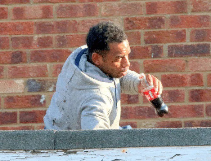 Eight-Hour Roof Stand-Off Ends Peacefully as Police Toss Man Bottle of Cola on Isle of Wight