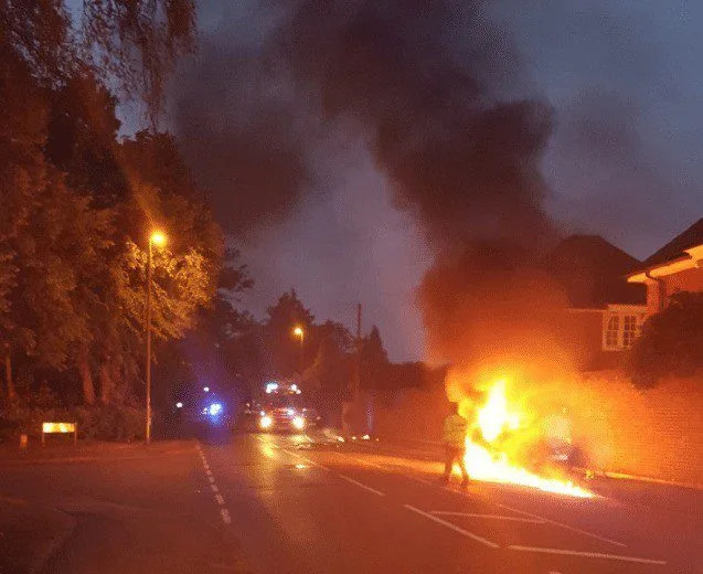 Weybridge Road Chaos as Car Bursts into Flames on Hangar Hill – No Injuries Reported