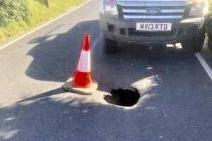 Sinkhole Swallows Isle of Wight Road, Emergency Repairs Underway