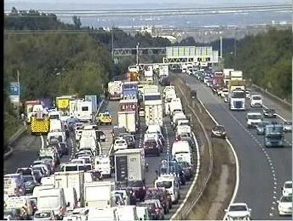 Horror on M25: Coach Crashes Through Barriers and Flips Near Swanley – Multiple Injuries Feared