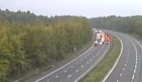 The M25 is closed after a crane has been in Collision with a Road sweeper