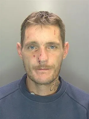 A man wielding a kitchen knife has been jailed for more than a year