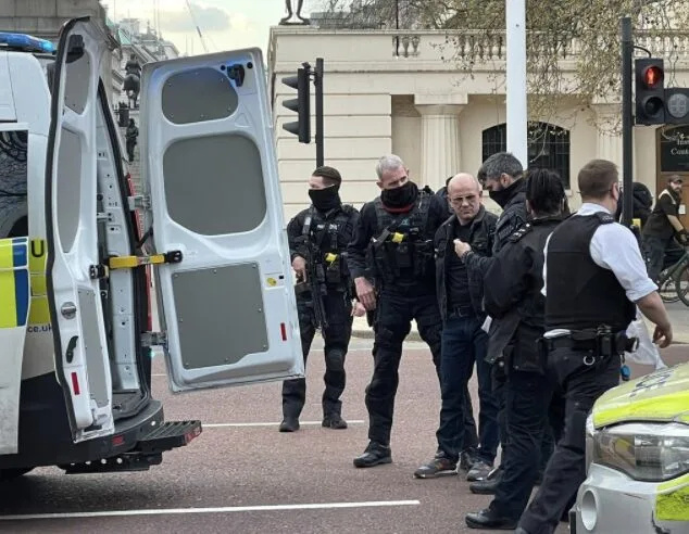 A man who was arrested after being found in possession of an axe on The Mall has been charged