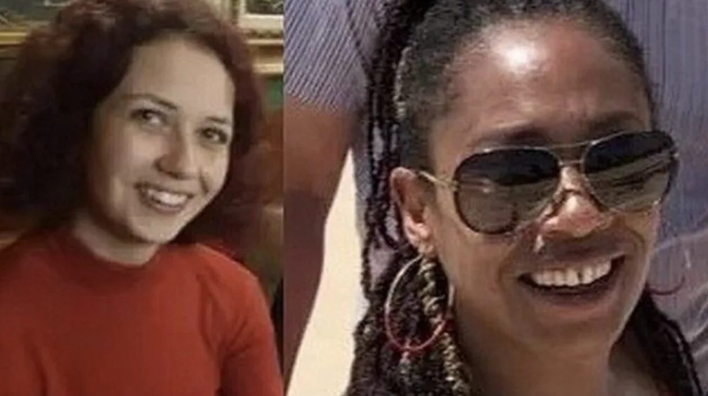 Two Met officers have appeared in court accused of taking and sharing photographs of the murder scene of two sisters stabbed to death in London