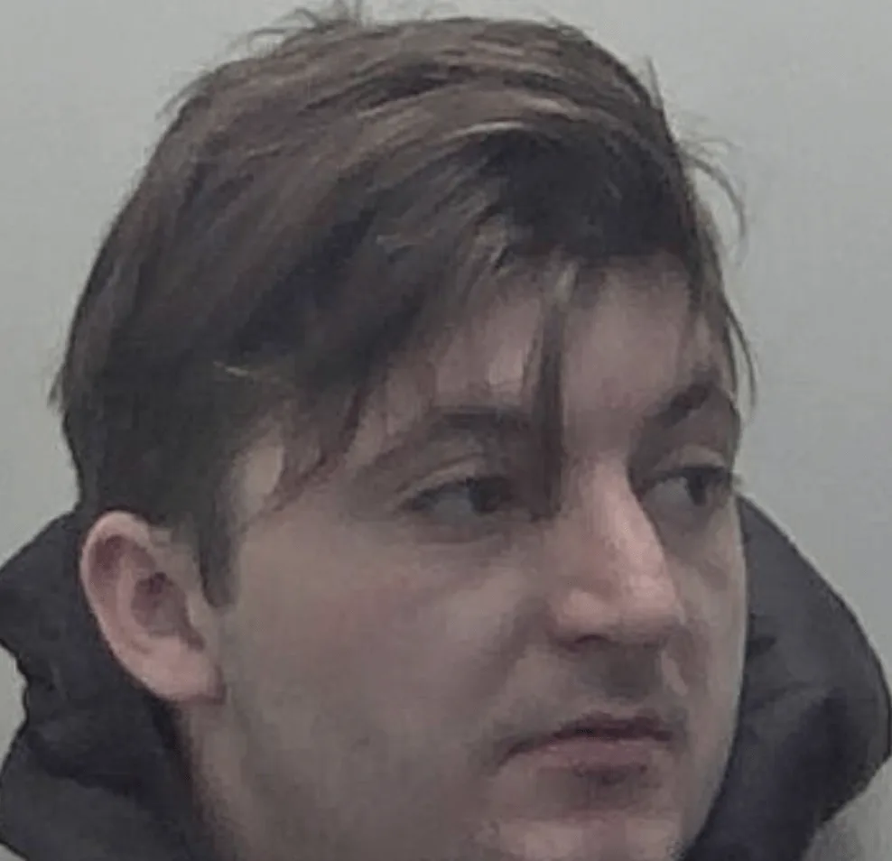 A thief who assaulted a shop worker and spat in the faces of two police officers has been jailed