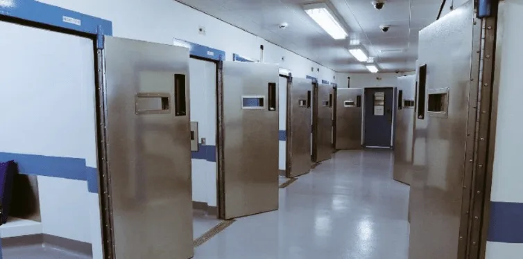 Two men have been charged in connection with a gambling investment scam based in Folkestone which is alleged to have defrauded victims out of more than £5 million