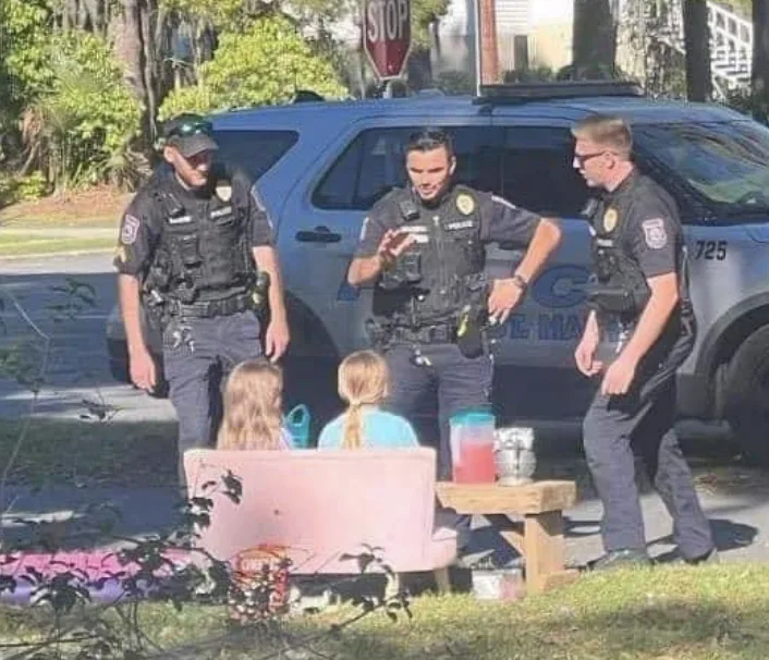 Cops Swap Cuffs for Cups: Local Officers Boost Young Entrepreneurs at Lemonade Stand