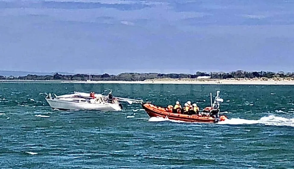 Hayling Lifeboats Race to Rescue Two Yachts in One Day – Eight Saved Including Beloved Dog!