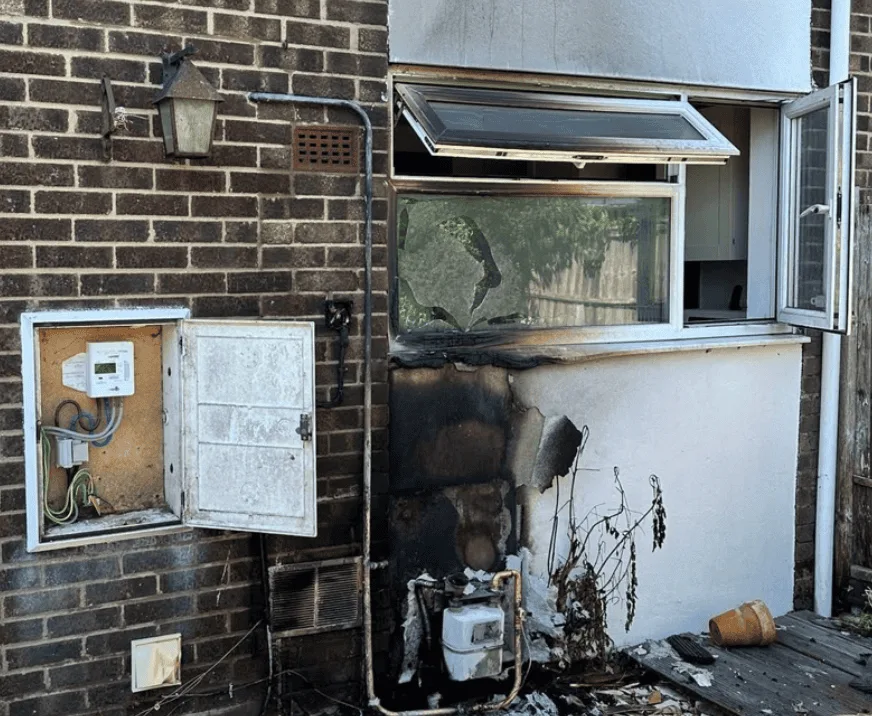 Careless Cigarette Ignites Dangerous Blaze Near Gas Main in Colchester: Firefighters Warn of Explosion Risk