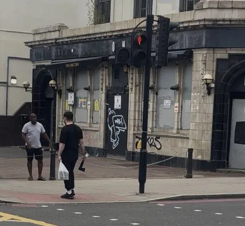 Man Arrested on Camden Road After Axe Sighting, No Injuries Reported