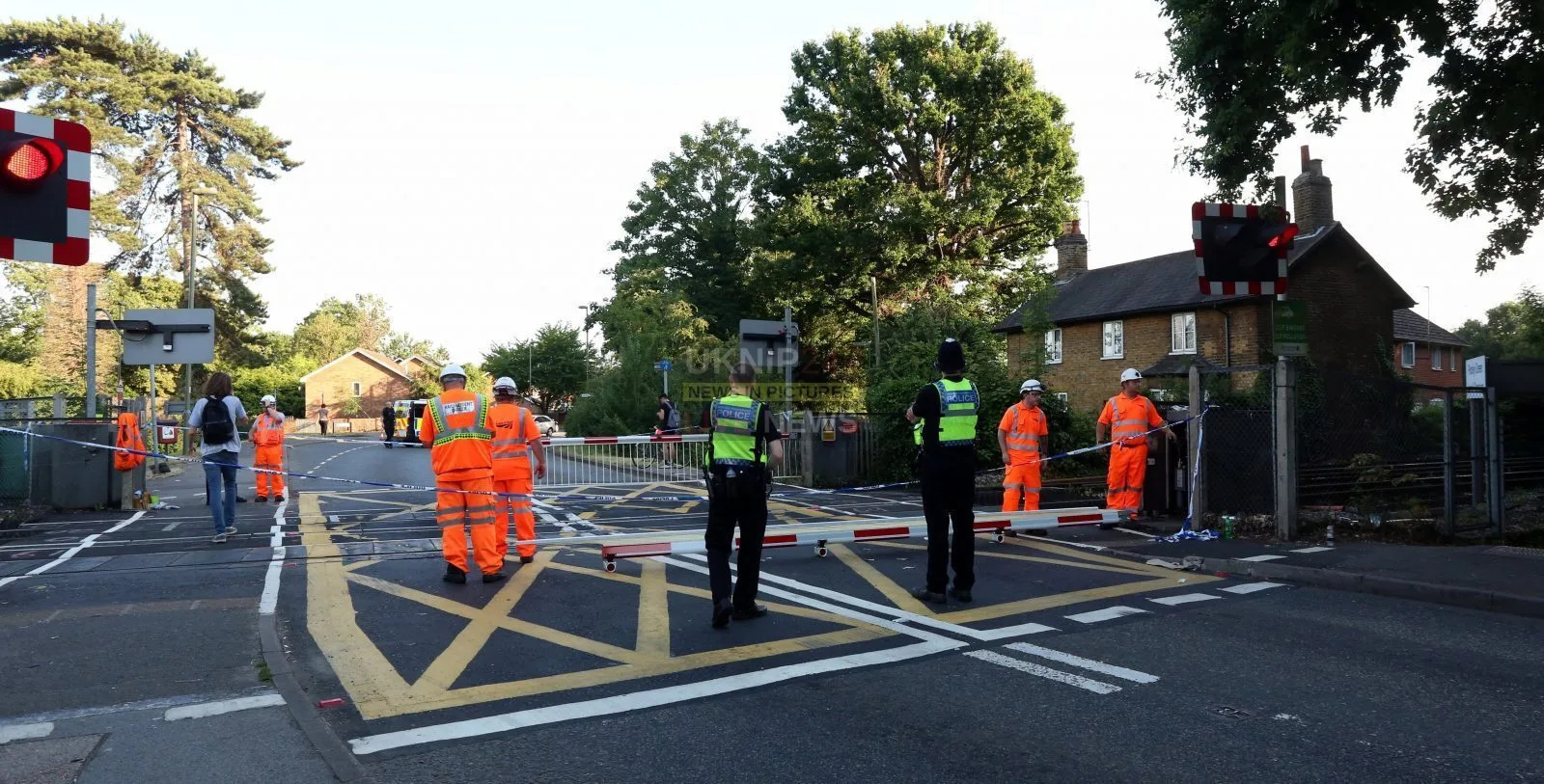 Woman Attacked at Egham Burger King as Car Crashes Through Train Crossing Barrier