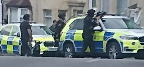 Armed Police and Dog Unit Lock Down Dover Street in Major Incident