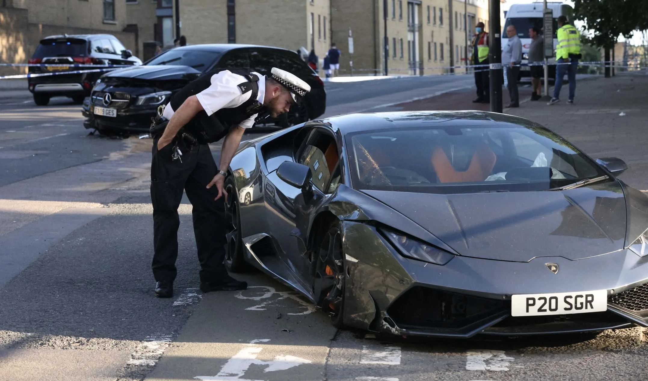 Manhunt launched after driver of £200K Lamborghini Huracan that was racing is involved in a three vehicle hit and run collision in London