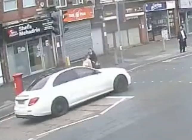 Car Speeds Towards Jewish Family on Salford Crossing in Hate Crime Investigation