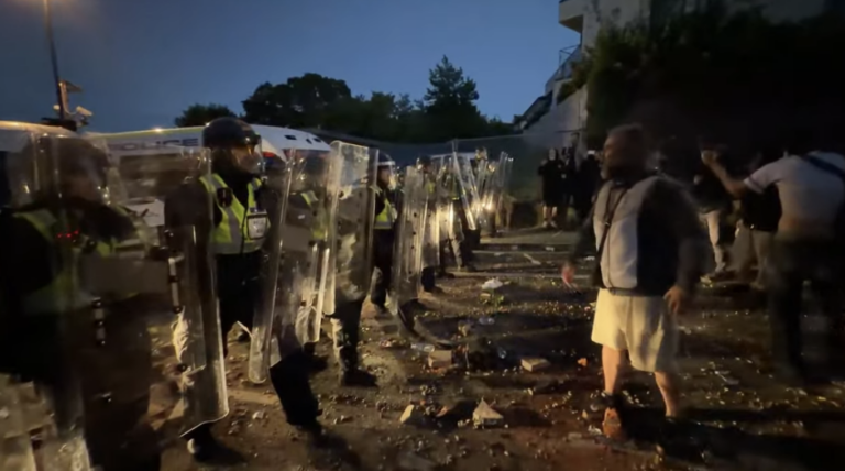 Riot Police Confront Protesters Close to Henry Nowak Stabbing Scene