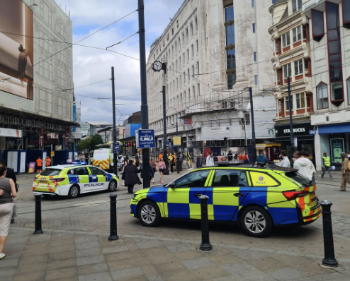 Emergency Services Respond to Serious Incident on Manchester’s Market Street as Trams Halted