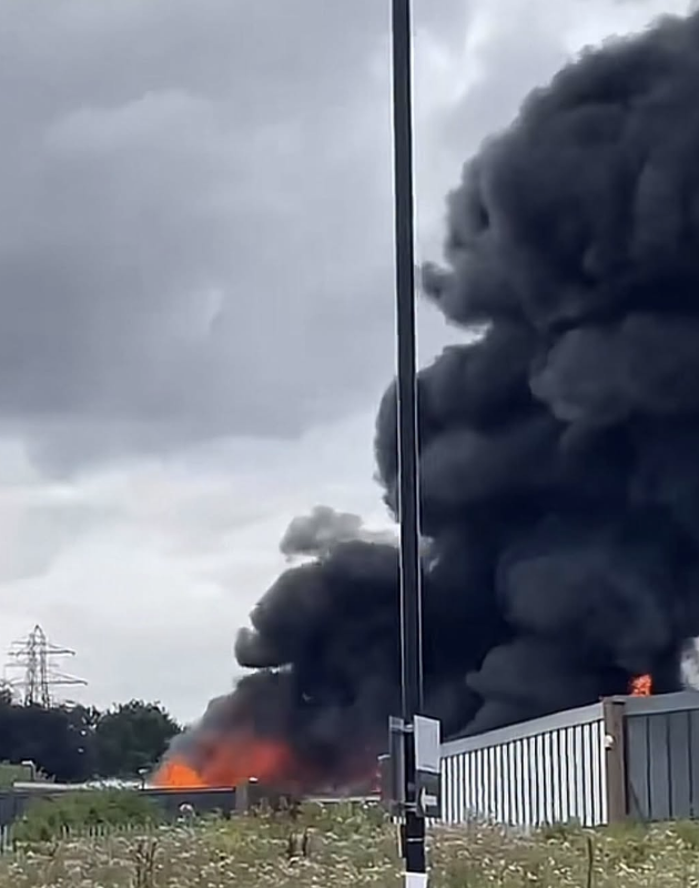 Huge Factory Fire Sends Thick Black Smoke Billowing Across Washington Following Reports of Explosions
